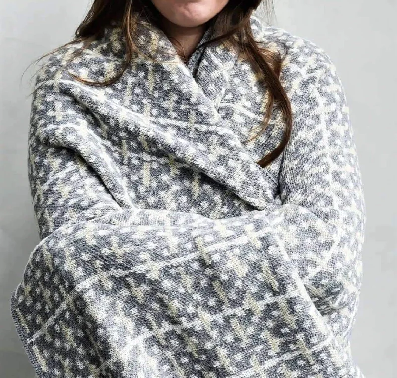 Sherpa lined fleece blankets for warmth​Linen blankets with a rustic and textured lookEco Retro Grey and Ivory Woven Throw