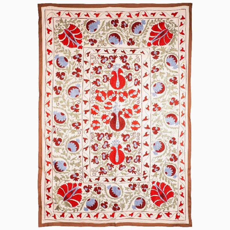 Knitted chunky cable knit throw blankets​Silk blankets with a smooth and elegant touchCorners In Coral Suzani Blanket